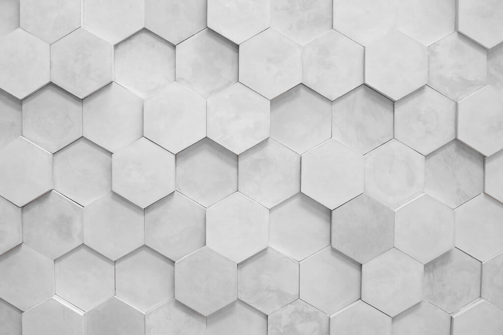 Hexágonos brancos numa parede Hexágonos brancos numa parede