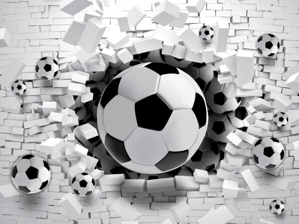 Bola de futebol a atravessar uma parede de tijolo u96315p 600x450 - Bola de futebol a atravessar uma parede de tijolo