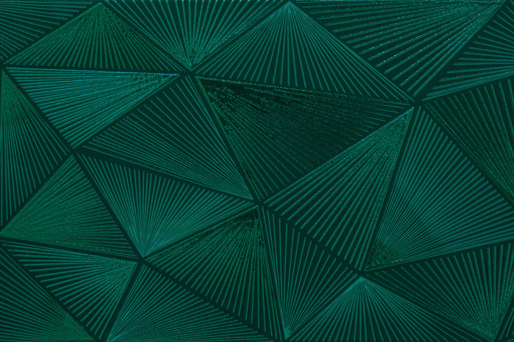 Padrão triangular verde numa superfície verde Padrão triangular verde numa superfície verde