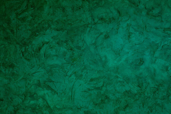 Parede verde com uma superfície rugosa Parede verde com uma superfície rugosa
