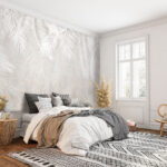 Papel de parede Folhas brancas sobre uma superfície cinzenta