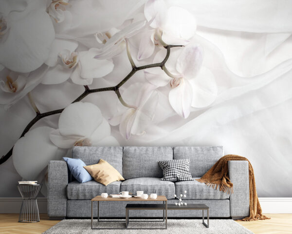 Orquídeas brancas sobre um tecido branco Orquídeas brancas sobre um tecido branco