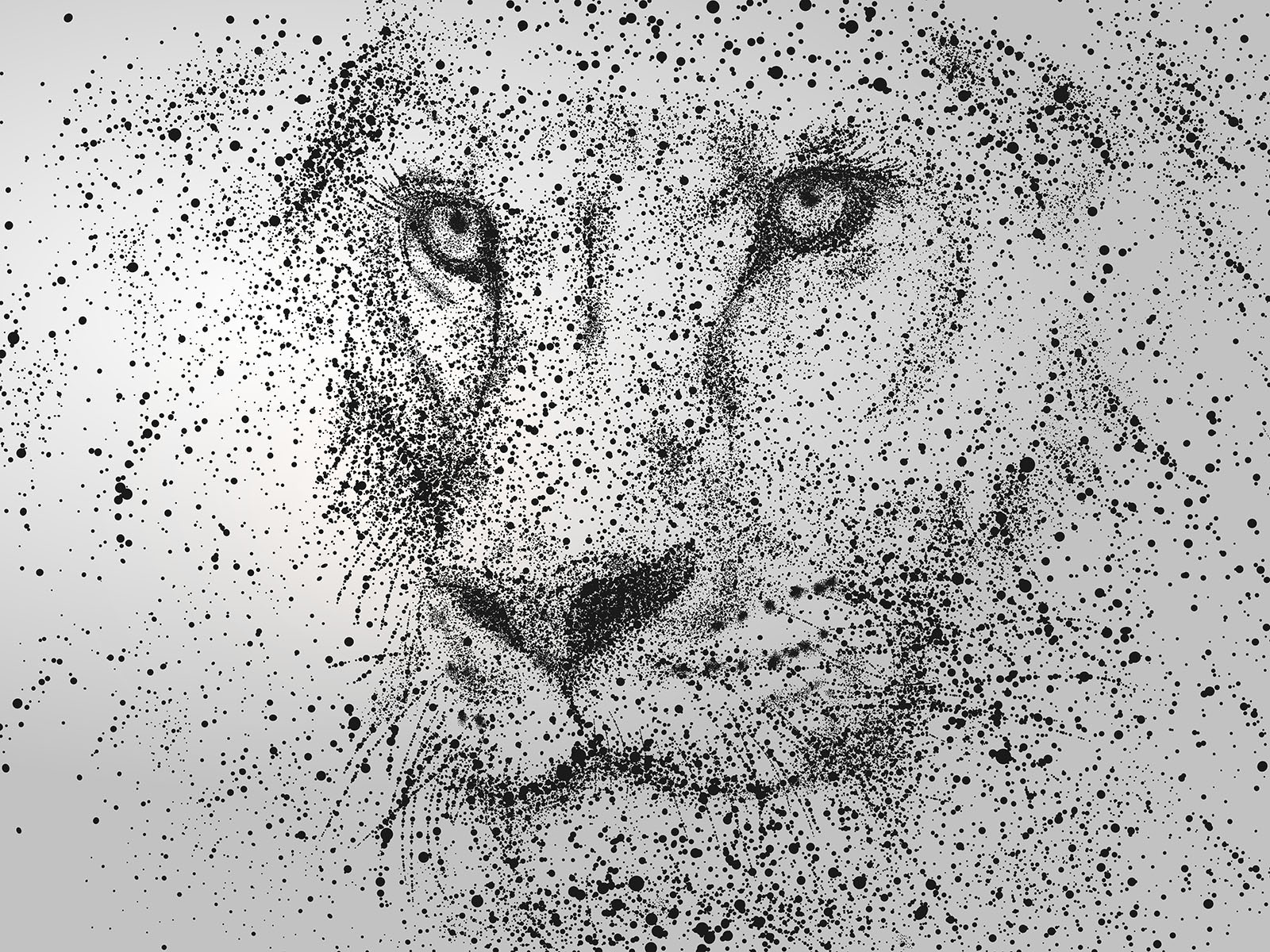 Lion's face with black specks