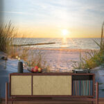 Papel de parede Praia com relva e uma massa de água