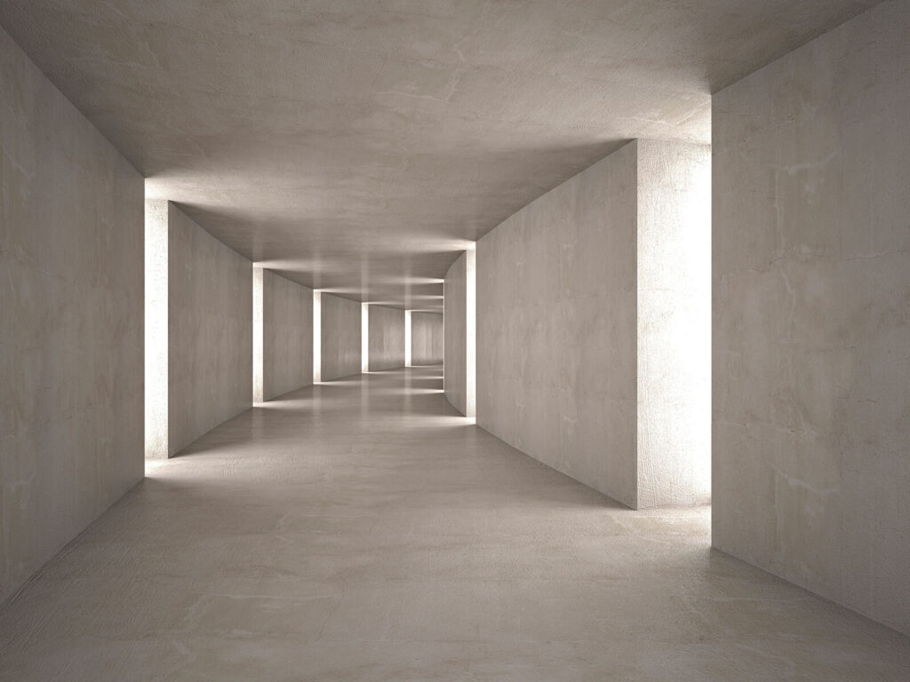 Corredor comprido com luz a atravessar Corredor comprido com luz a atravessar