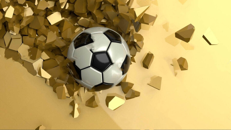 Bola de futebol num monte de pedaços Bola de futebol num monte de pedaços
