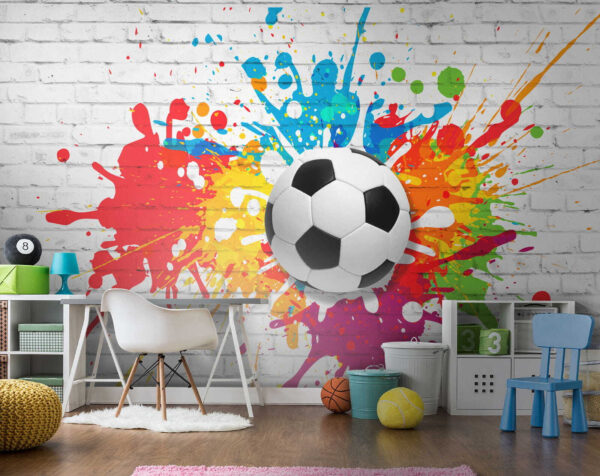 Bola de futebol numa parede de tijolo Bola de futebol numa parede de tijolo