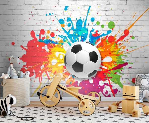 Bola de futebol numa parede de tijolo Bola de futebol numa parede de tijolo