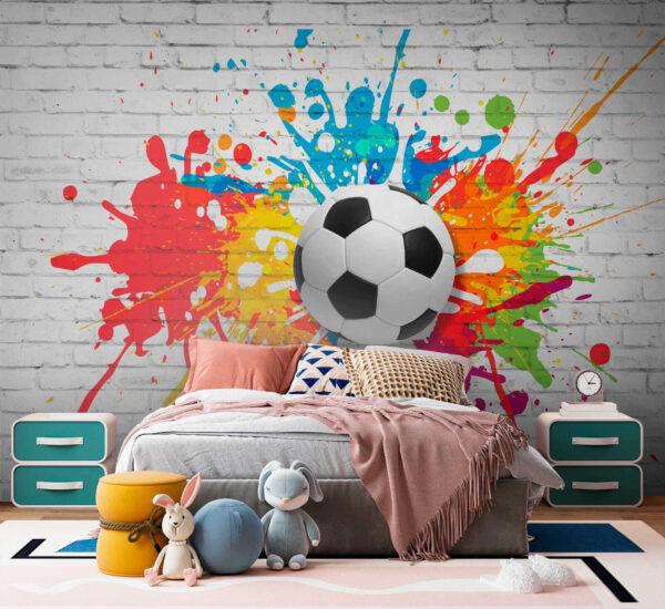 Bola de futebol numa parede de tijolo Bola de futebol numa parede de tijolo