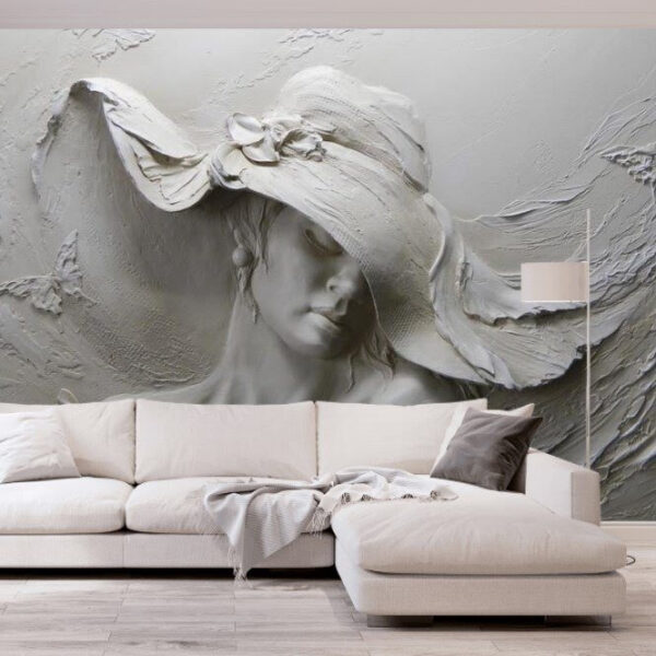 Escultura de uma mulher com um chapéu Escultura de uma mulher com um chapéu