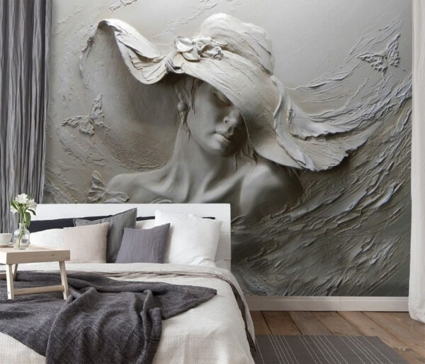 Escultura de uma mulher com um chapéu Escultura de uma mulher com um chapéu