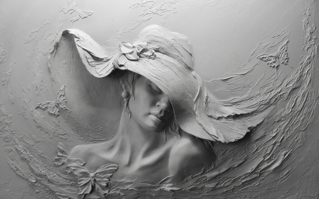 Escultura de uma mulher com um chapéu Escultura de uma mulher com um chapéu