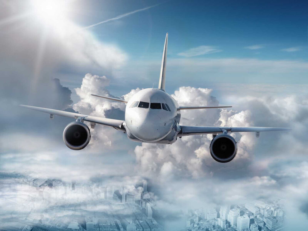 Um avião a voar no céu Um avião a voar no céu