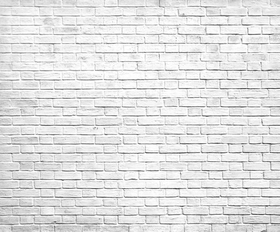 Parede de tijolo branco com muitos tijolos pequenos