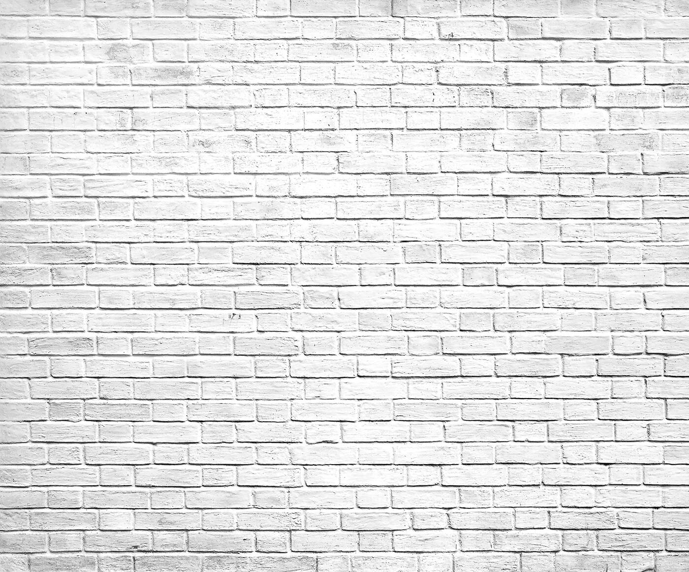White brick wall with many small bricks White brick wall with many small bricks
