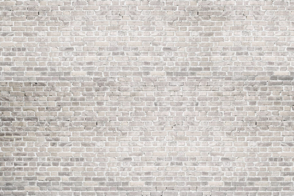 Parede de tijolo branco com tijolos cinzentos Parede de tijolo branco com tijolos cinzentos