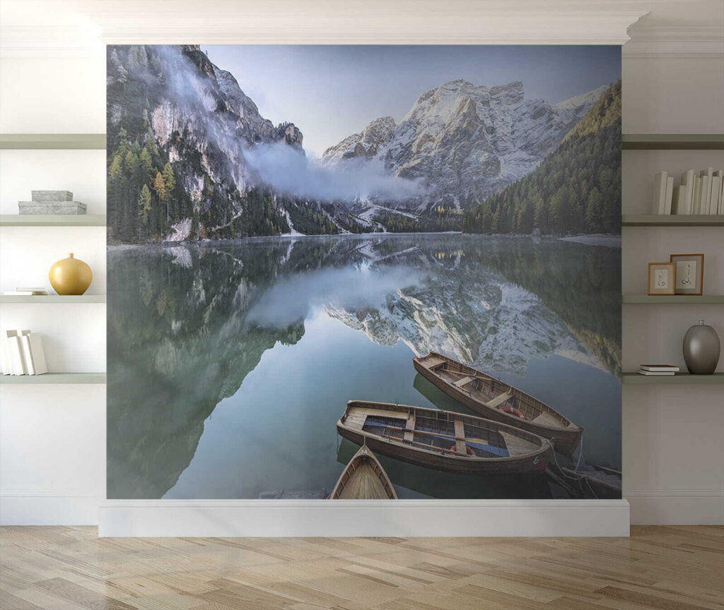 Boats on a lake with mountains in the background Boats on a lake with mountains in the background