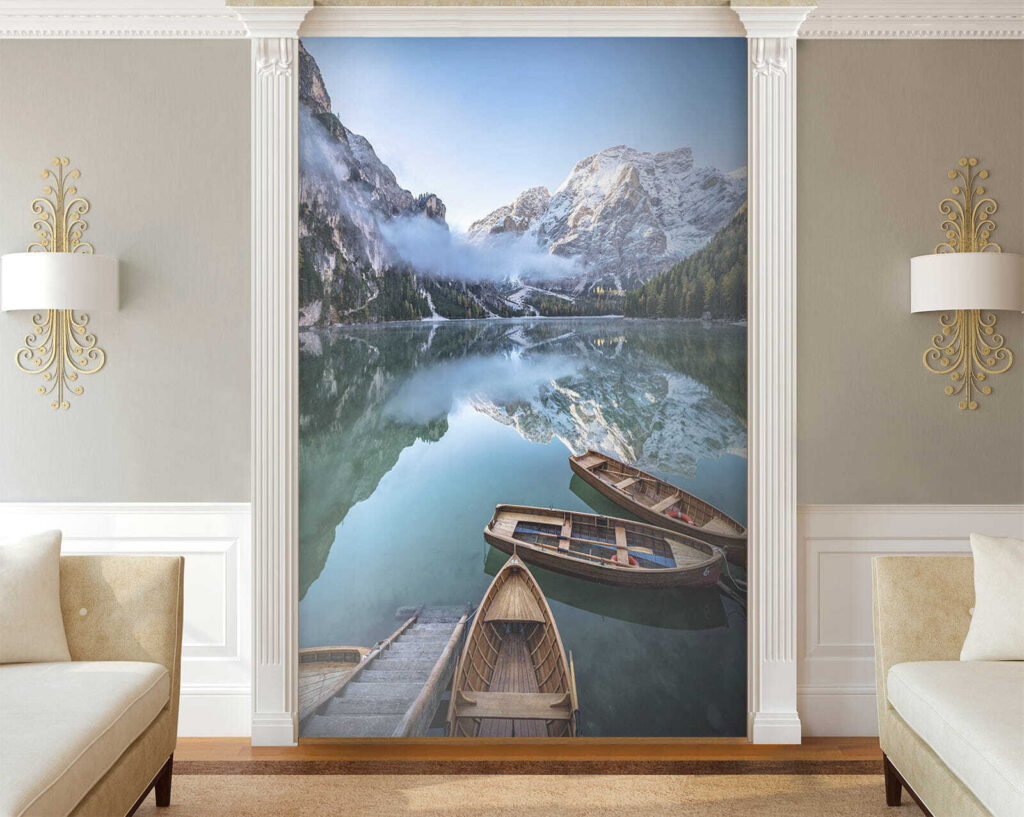 Boats on a lake with mountains in the background Boats on a lake with mountains in the background