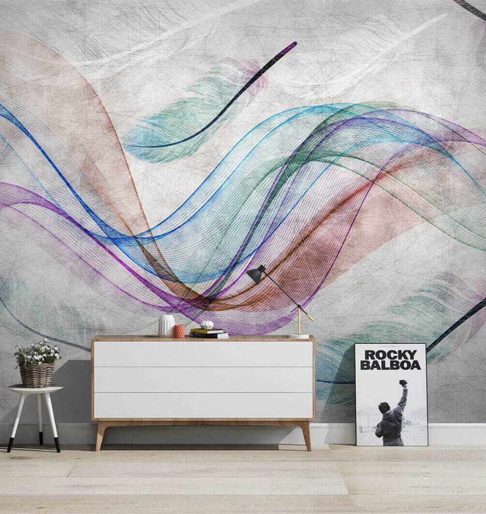 Colorful feathers on a white surface Colorful feathers on a white surface