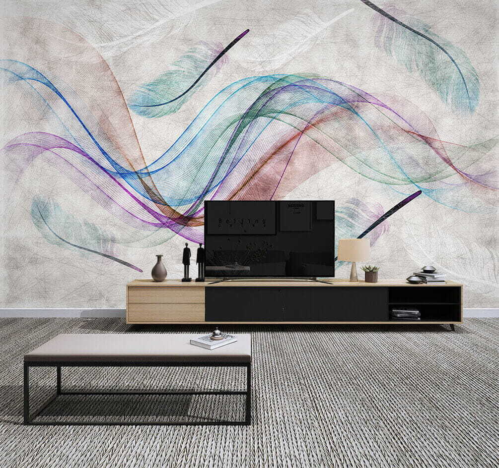 Colorful feathers on a white surface Colorful feathers on a white surface