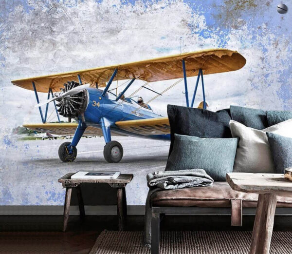 Avião azul e amarelo numa pista de aterragem Avião azul e amarelo numa pista de aterragem