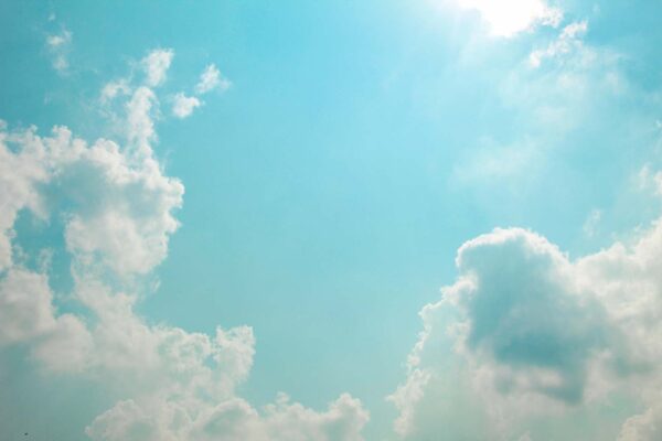 Wall murals Blue sky with clouds and sun Wall murals Blue sky with clouds and sun