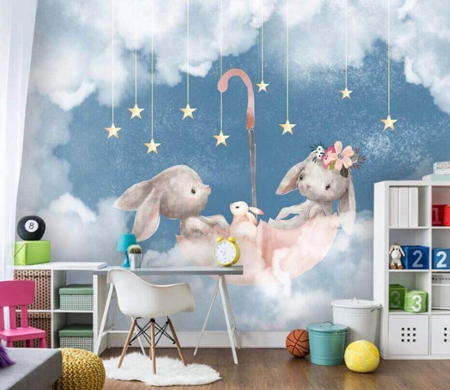 Dois coelhos num chapéu de chuva cor-de-rosa