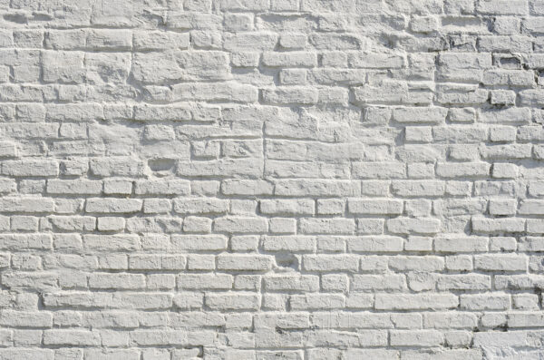 Parede de tijolo branco com manchas pretas Parede de tijolo branco com manchas pretas