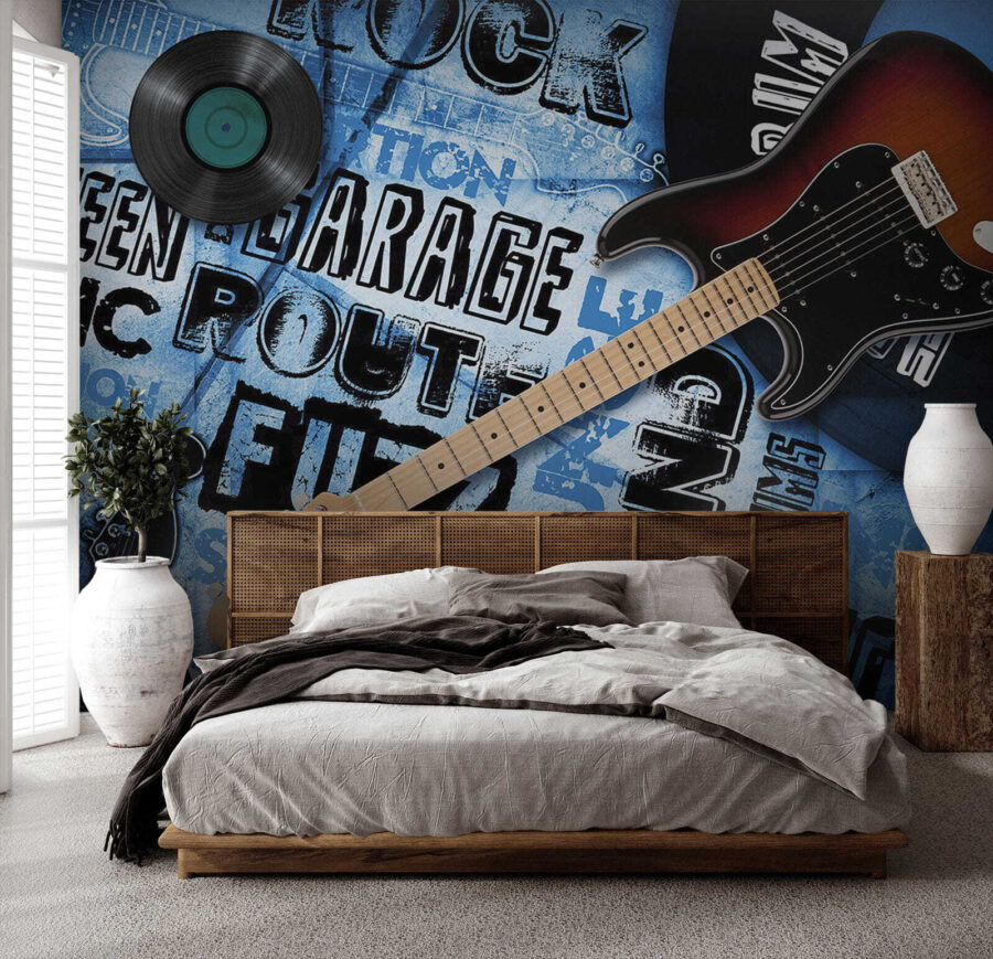 Guitarra e disco sobre um fundo azul
