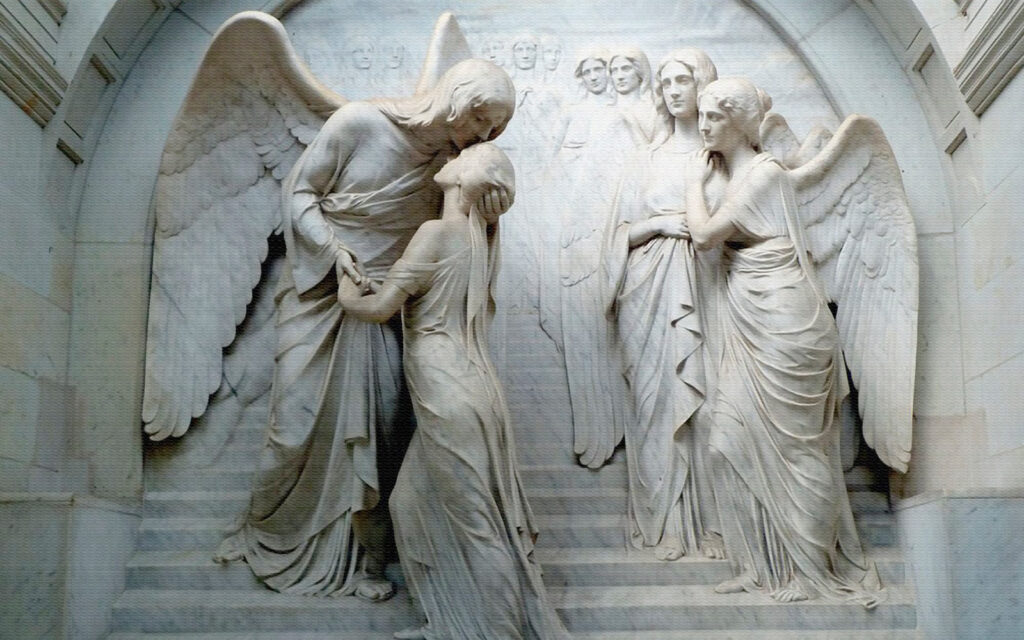 Estátua de um homem a beijar uma mulher Estátua de um homem a beijar uma mulher