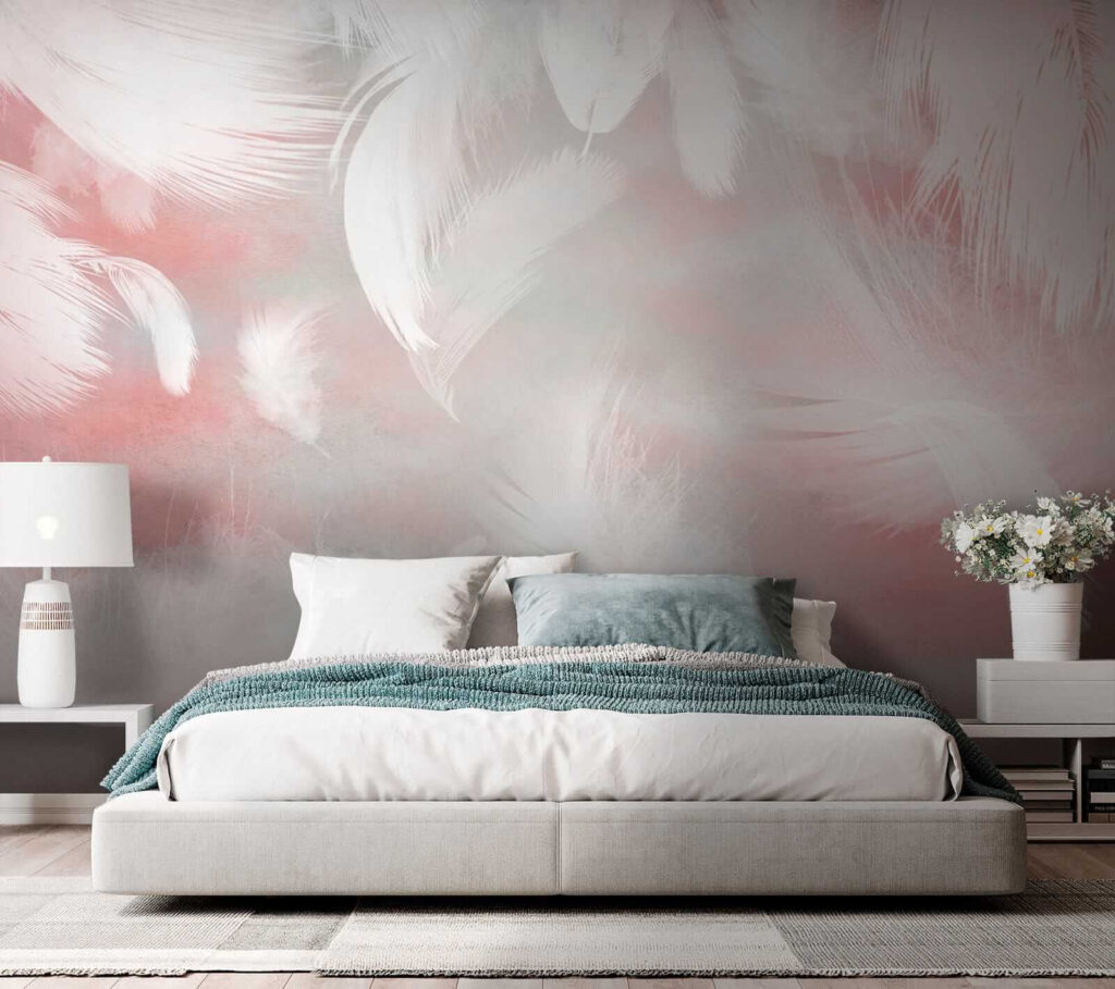 White feathers on a pink background White feathers on a pink background