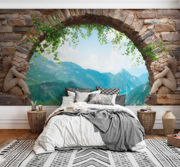 Arco de pedra com estátuas de pedra e vista para um vale e montanhas Arco de pedra com estátuas de pedra e vista para um vale e montanhas