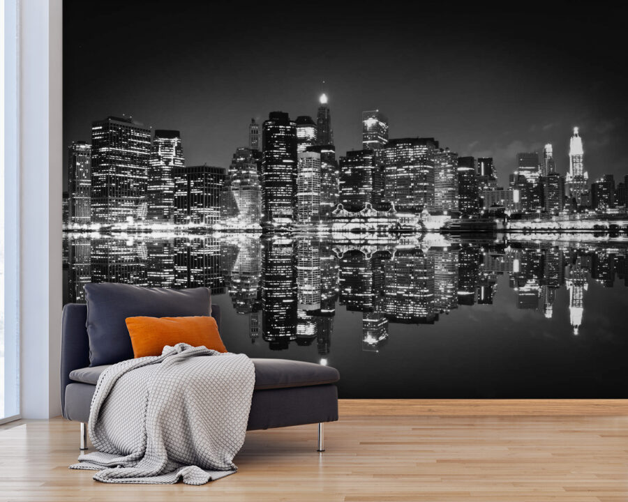 Horizonte da cidade à noite com luzes a refletir na água Horizonte da cidade à noite com luzes a refletir na água