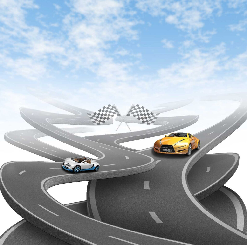 Dois carros numa estrada sinuosa Dois carros numa estrada sinuosa