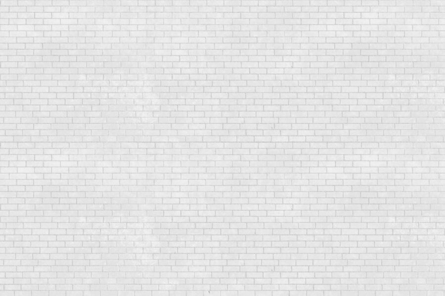 Parede de tijolo branco com muitos tijolos pequenos