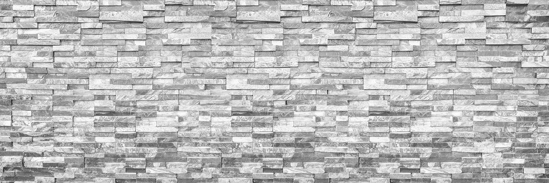 Textured stone wall in monochrome design