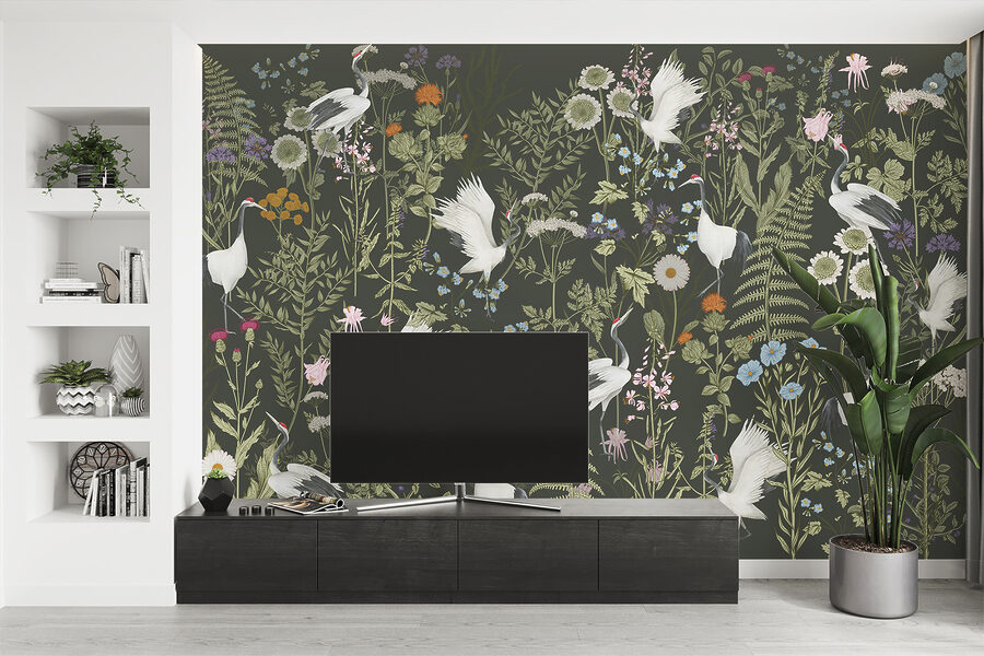 Um papel de parede com pássaros e flores