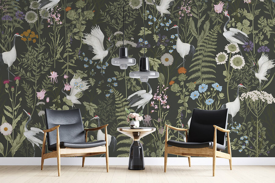 Um papel de parede com pássaros e flores