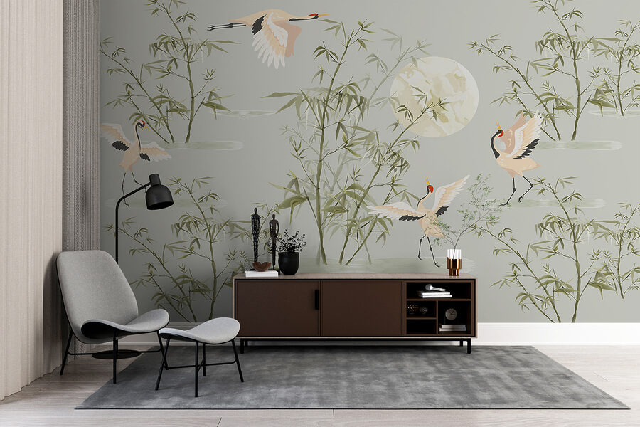 Um papel de parede com pássaros e bambu