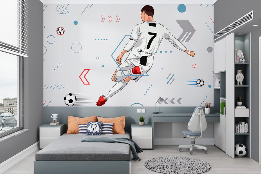 Um jogador de futebol a pontapear uma bola