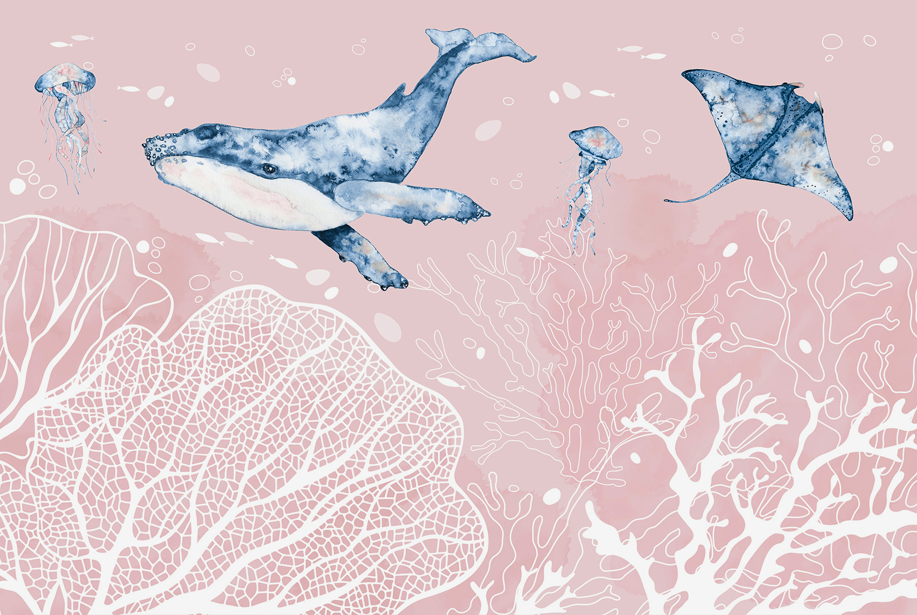 A whale and stingrays swimming in the ocean