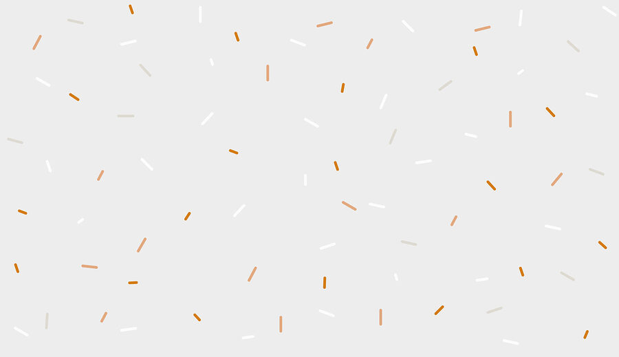 Um granulado branco e laranja sobre um fundo cinzento