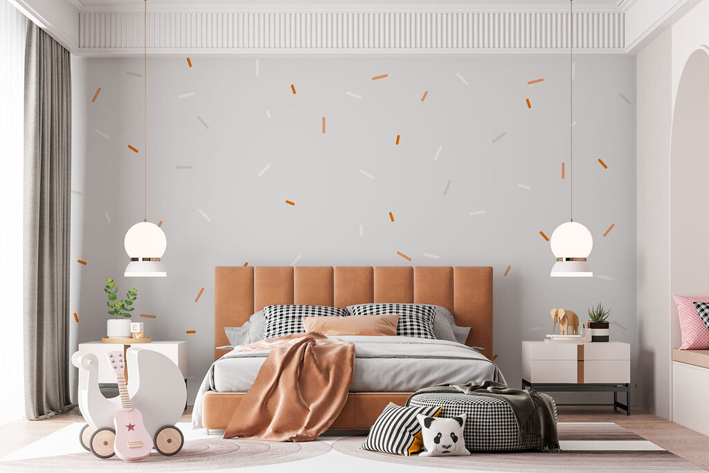 A white and orange sprinkles on a gray background A white and orange sprinkles on a gray background