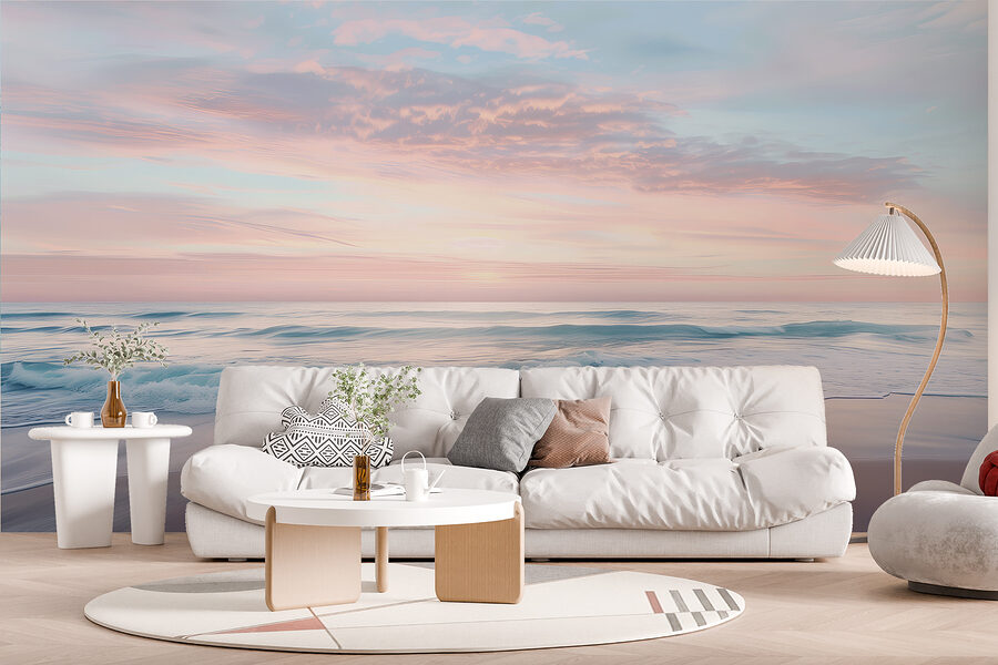 Uma praia com ondas e um céu cor-de-rosa