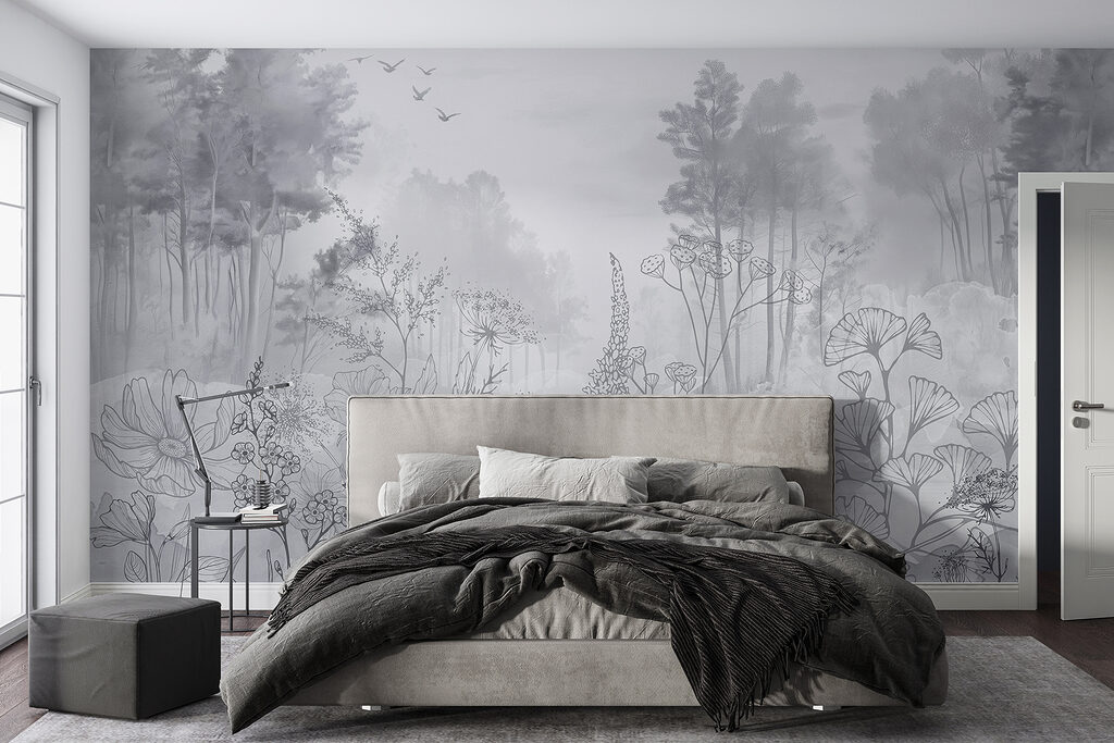 Greyscale image of a forest with birds flying