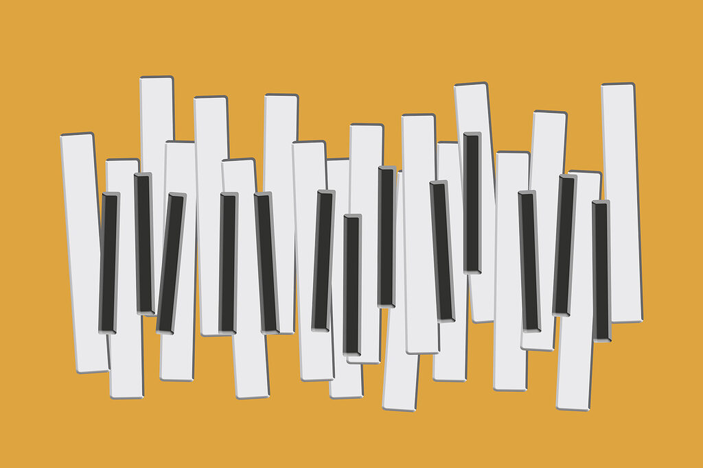 Teclas de piano num fundo amarelo Teclas de piano num fundo amarelo