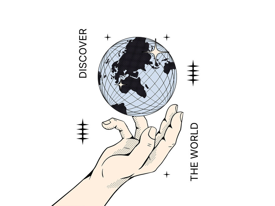 Mão a segurar um globo terrestre