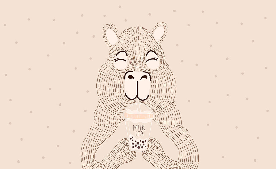 Desenho animado de um urso a segurar um chá de bolhas