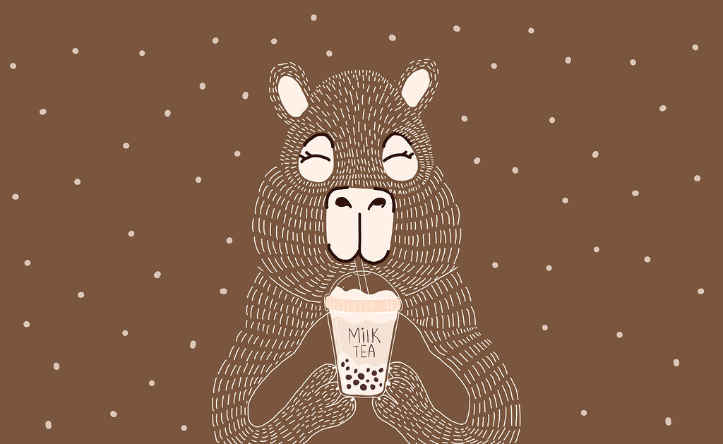 Animal de desenho animado a segurar uma chávena de chá com leite Animal de desenho animado a segurar uma chávena de chá com leite