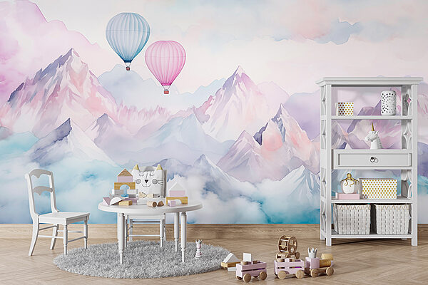 Group of hot air balloons in the sky over mountains